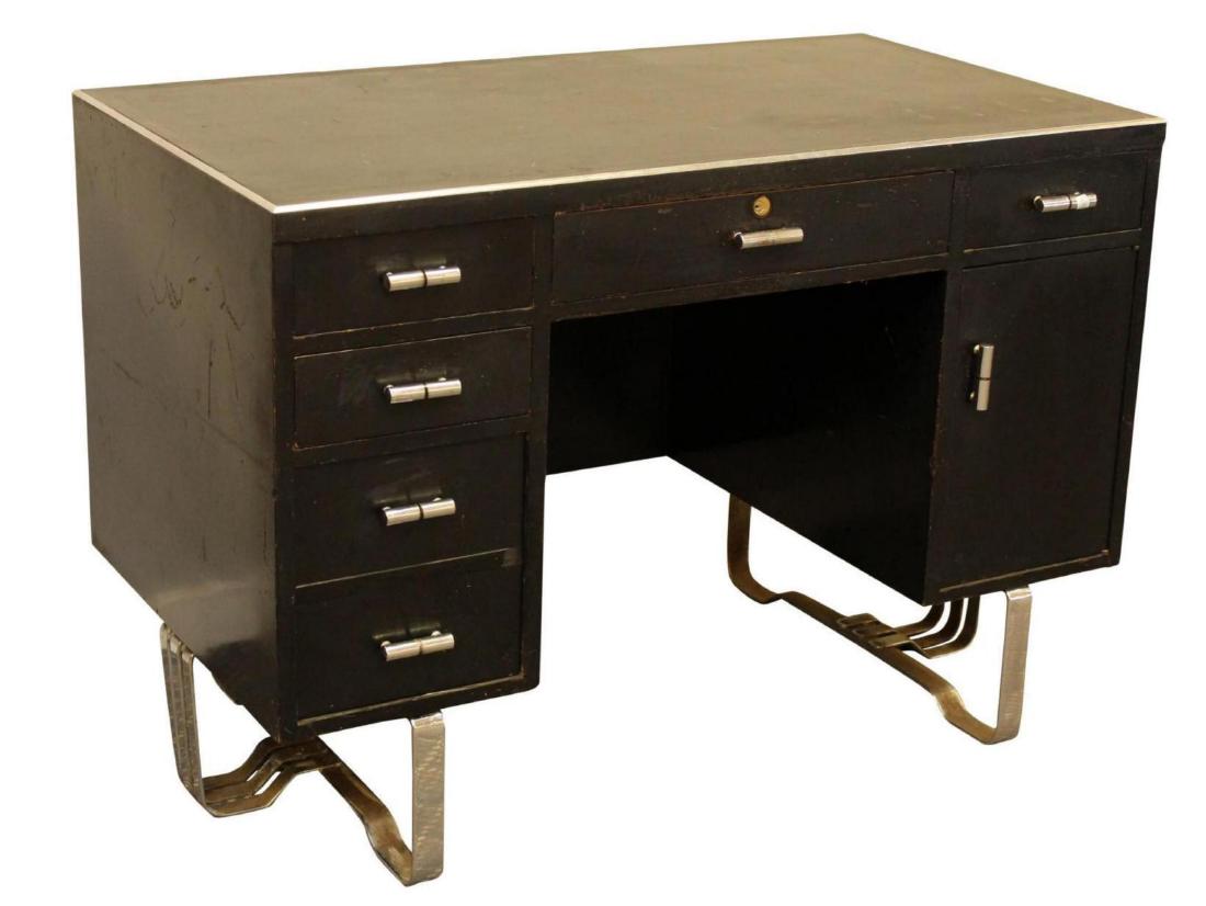 Wolfgang Hoffmann Desk: Ebonized wood on chrome base. 31"H x 44"W x 24"D