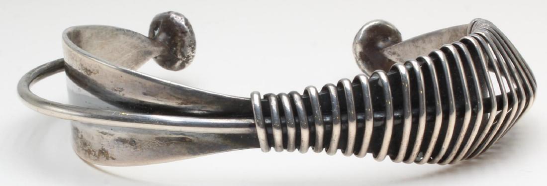 Bracelet. Ed Wiener. Sterling Silver Modernist Cuff: 16.0mm wide. 29.3gtw.