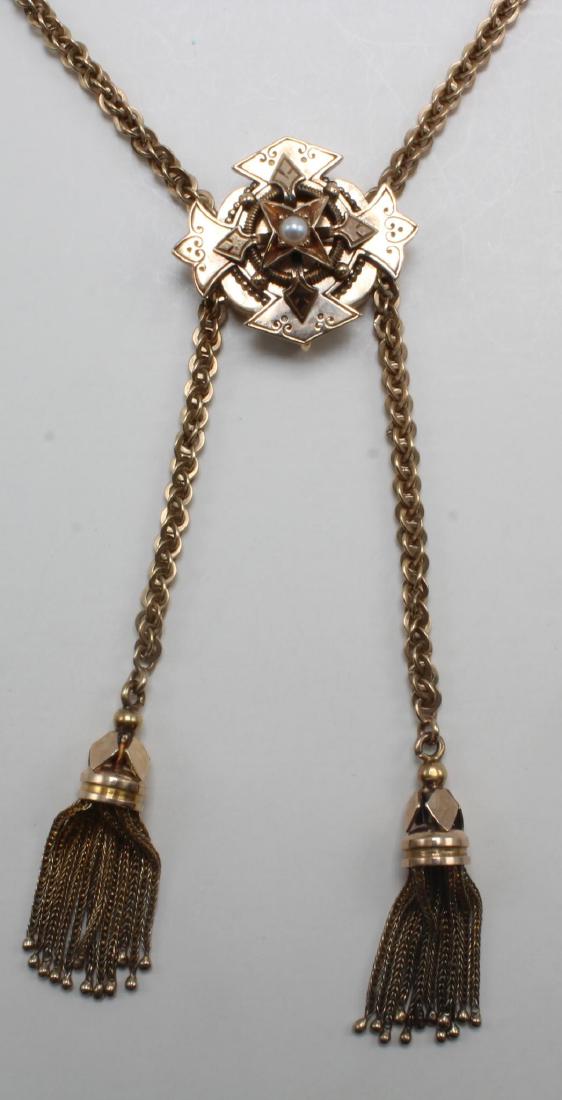 Necklace. Tassels. Pearl. 14K Yellow Gold: Victorian style. 17" long plus tassels. Pressure tongue barrel clasp with enamel detailing. 33.4gtw.