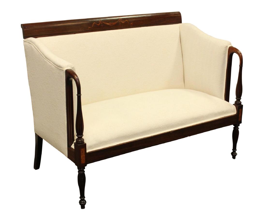 Upholstered Settee and Chair: Sheraton white upholstered settee with rounded arms, reeded arm supports and front legs, with inlaid detailing on legs and top rail. Measures 48"w x 26"d x 36"h and White upholstered chair with reed