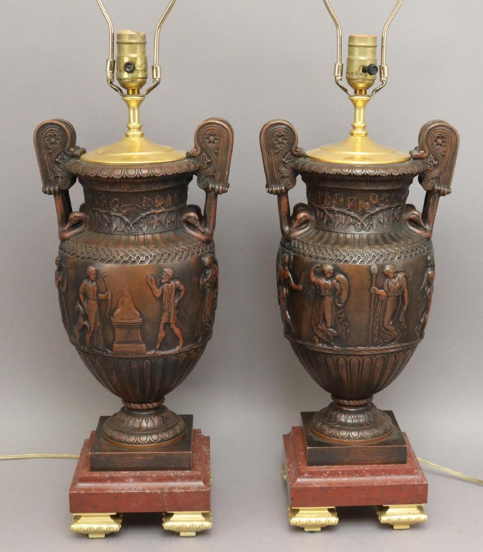 Greek Revival Table Lamps: Pair of amphora vase style lamps on marble bases with raised gilt feet. 32"h x 8"round