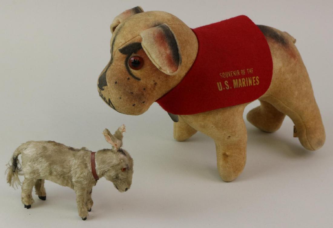 PAIR OF MISC. VINTAGE ANIMALS.: 5" L. Unmarked plush donkey squeak toy with amber glass eyes. (Still squeaks). 11" L. Tan felt bulldog tagged: Another Personality Pet by Collegiate Mfg. Co., Ames, Iowa. Dog is named DAN. Blanket say