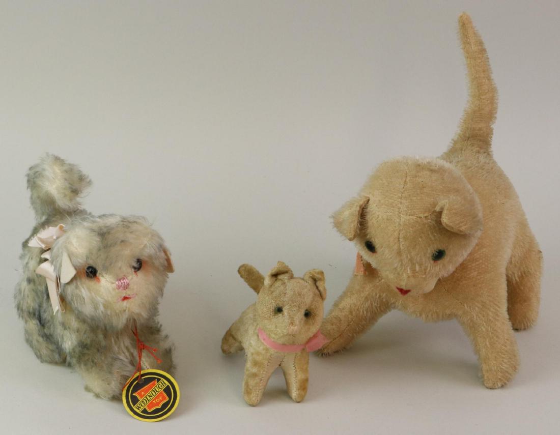 LOT OF (3) VINTAGE UNMARKED CATS.: 8" Camel mohair with green glass eyes.5 1/2" T. Tagged A WOOLNOUGH Toy gray/white mohair with black shoe button eyes, white felt ears, original neck ribbon. 4 1/2" T. Made in Occupied Japan ivory plus