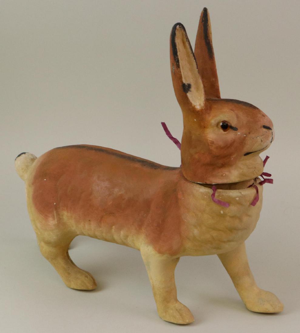 LOT OF HOLIDAY/NOVELTY ITEMS.: 11 1/2" L x 12" T. Papier mache "Rabbit" candy container marked Germany. Amber glass eyes. Condition: (1) ear has been glued back on. Crack on face between right eye and nose. (1) Eye has loss. This l