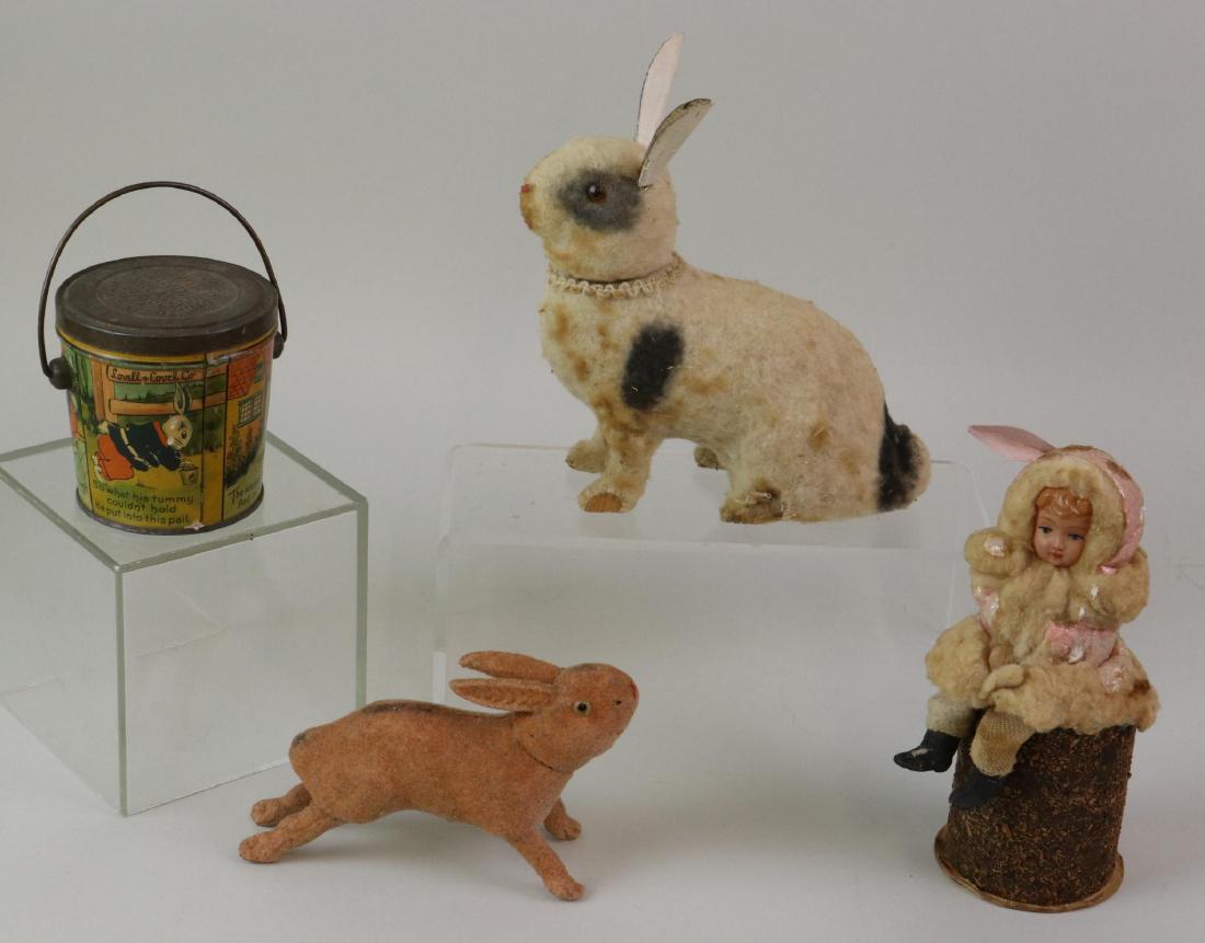 LOT OF HOLIDAY/NOVELTY ITEMS.: Pair of candy containers. 6 3/4" T. Papier mache "Rabbit" covered with black/white flannel, amber glass eyes. 6 1/3" T Cotton batting "Child" sitting on papier mache stump. Child has a celluloid face.