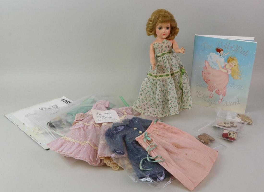 LOT OF MARY HOYER.: 14" Hard plastic Mary Hoyer doll with honey blonde hair. She comes with only a tagged velvet coat/hat combination and has (6) bags of clothing made from original Hoyer patterns. Some bags have multipl