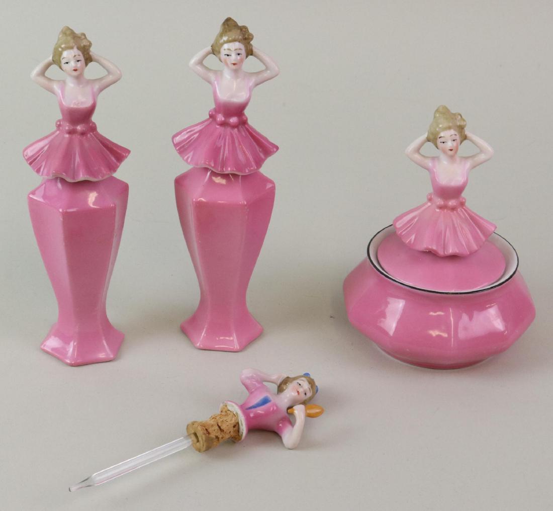 LOT OF HOLIDAY/NOVELTY ITEMS.: Lot of china dressing table items marked Bavaria. All items are of ladies dressed in pink with ruffled skirts (which are the tops). Covered dish, (2) perfume bottles. Also, the top ONLY of another per