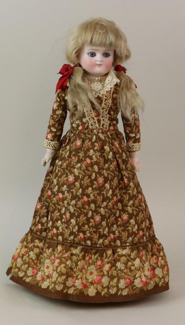 ANTIQUE BISQUE HEAD GERMAN DOLL.: 15 1/2" 698 # 6 Turned shoulder head doll with blue sleep eyes, closed mouth, blonde mohair wig, plaster pate. Pin jointed cloth body with bisque lower arms. Dressed in all antique clothing - cotton p