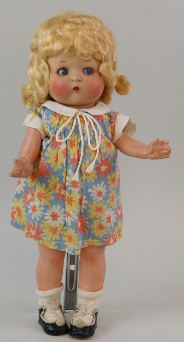 ANTIQUE BISQUE HEAD GERMAN DOLL.: 13" JUST ME Registered. Germany A.310/0.M has a painted bisque head with blue side glance sleep eyes, closed mouth. Curly blonde floss type wig appears to be original. 5 Pc. papier mache toddler style