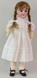 ANTIQUE BISQUE HEAD GERMAN DOLL.