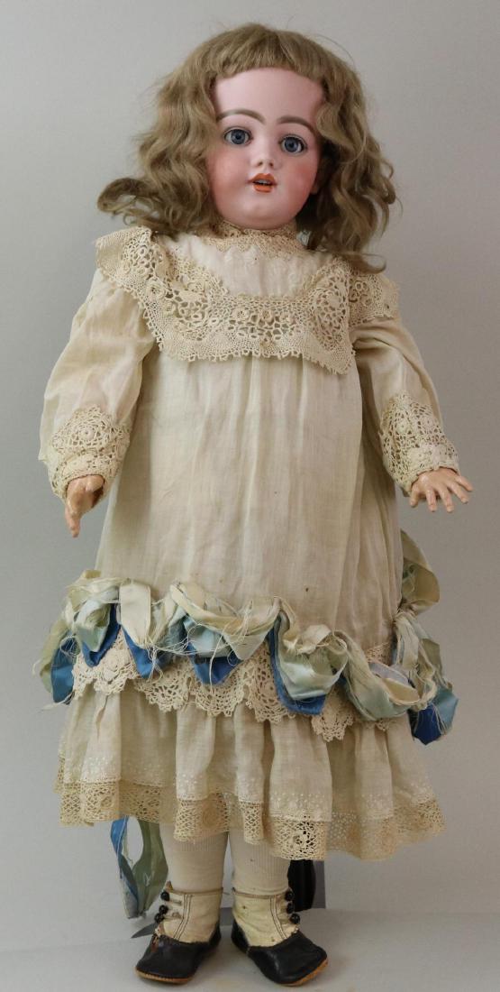 ANTIQUE BISQUE HEAD GERMAN DOLL.: 29" S & H 1009 DEP St. with blue sleep eyes, open mouth, pierced ears, honey blonde mohair wig. Papier mache ball jointed body is marked (red stamp) GERMANY 5 3/4. Dressed in antique white cotton clot