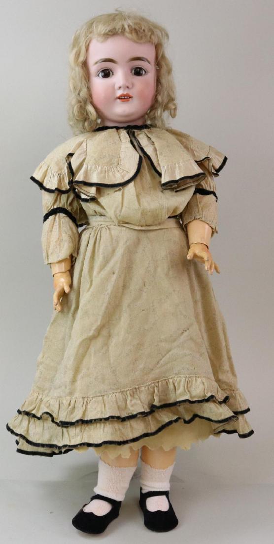 ANTIQUE BISQUE HEAD GERMAN DOLL.: 30" M Made in Germany 16 146 with brown sleep eyes, open mouth, blonde mohair wig, plaster pate. Very clean papier mache ball jointed body is marked (red stamp) Excelsior Germany 6 1/2. Dressed in ant