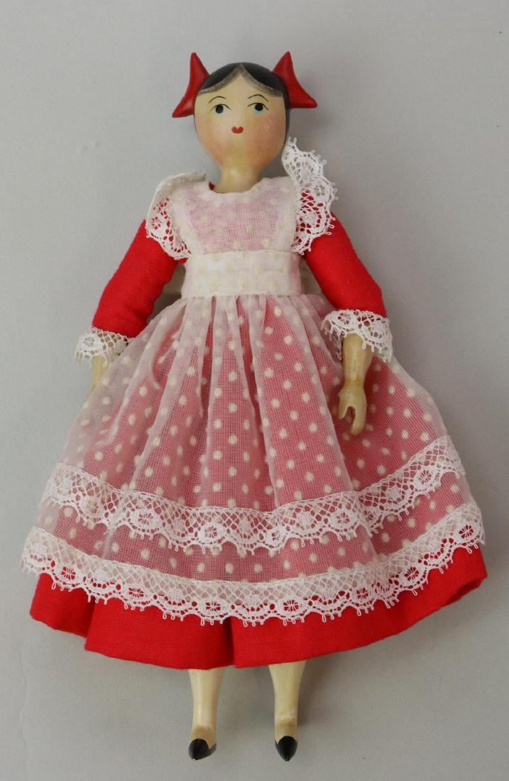 LOT OF SHERMAN E. SMITH WOOD DOLL(S).: 6" Signed S. Smith all wood doll 1/24/75 "Julie" with two red bows. Fully jointed body, mitt style hands, painted black slippers. Condition: nothing observed.
