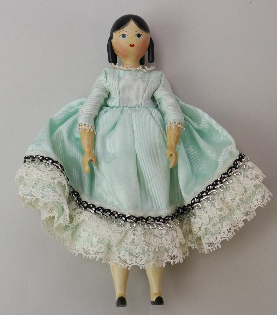 LOT OF SHERMAN E. SMITH WOOD DOLL(S).: 5 1/2" Signed S. Smith all wood doll 6/7/72 "Meg" with Victorian era side curls and around back, bun in back. Fully jointed body, mitt style hands, painted black slippers. Condition: nothing observed.