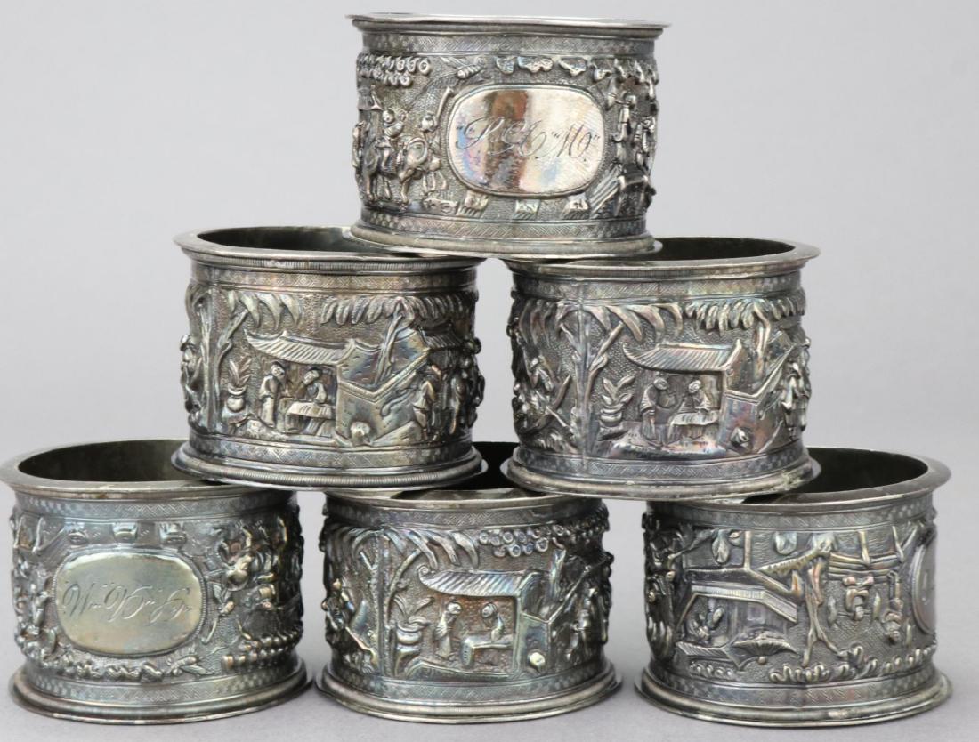 19th C. Chinese Silver Napkin Rings: Hong Xing mark, monogrammed with genre decoration throughout. 1.25"h x 1.75"round