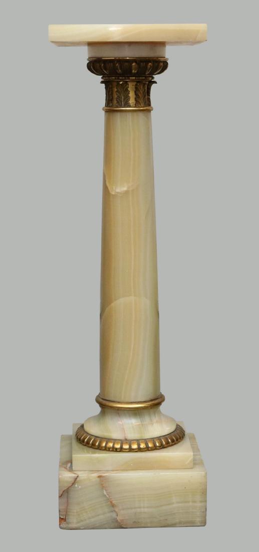 Marble Pedestal: Solid marble with gold ormolu accents on column. 40"h x 12"w x 12"d