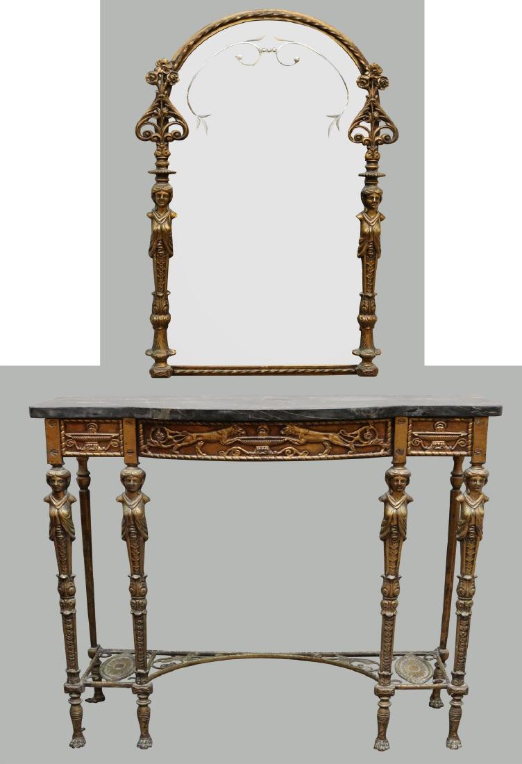 Egyptian Revival Pier Table and Mirror: Table has a marble serpentine top with Egyptian figures, lion, and urn motifs, 33”h x 33”w x 12.5”d. Gilt metal mirror Egyptian figures and motifs, 35”h x 22”d