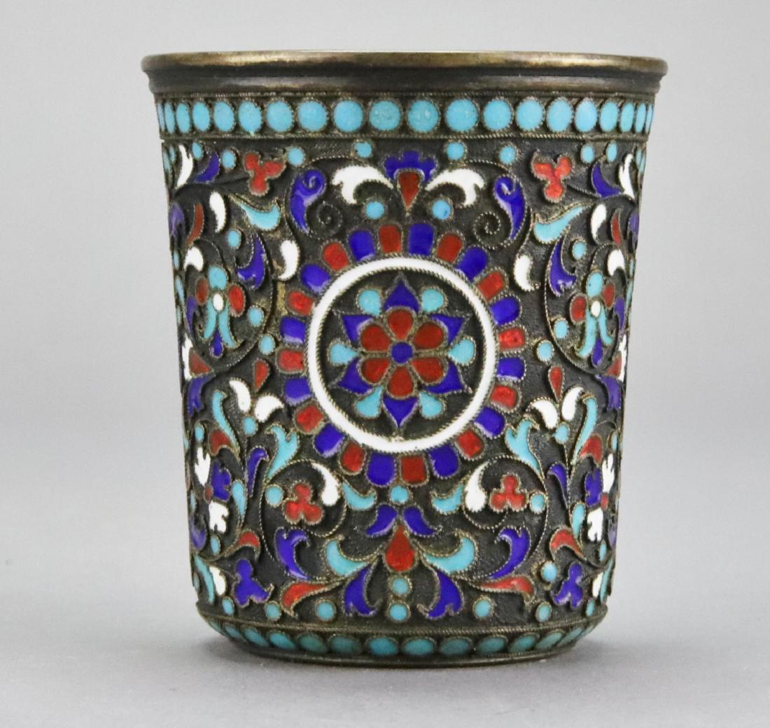 19th c. Russian Sterling and Enamel Shot Glass: Finely detailed floral decoration in traditional colors. Hallmarked with combined purity and city mark (Moscow) used between 1882-99. 2"h x 1.75"round