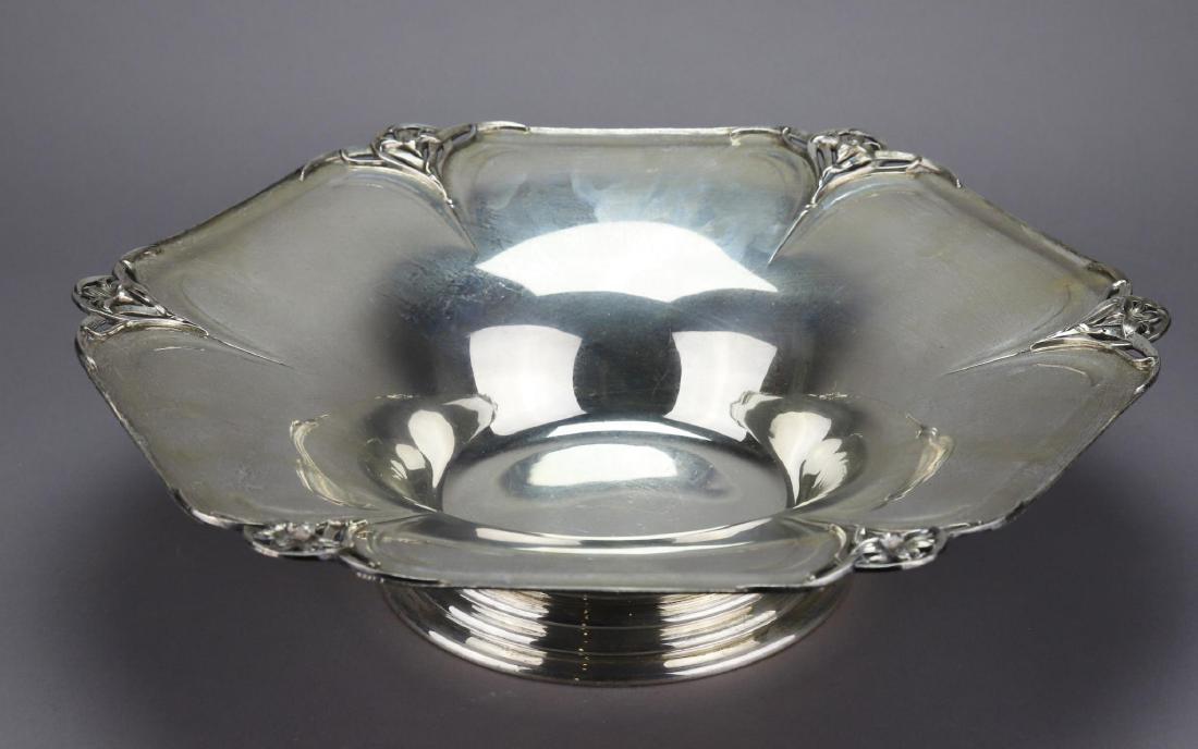 Sterling Silver Center Bowl: In the form of a flower with 6 reticulated lilies. Manufactured by the Watson Company, Attleboro, MA. 33.82 ozt. 3.5"h x 14"w x 14"d