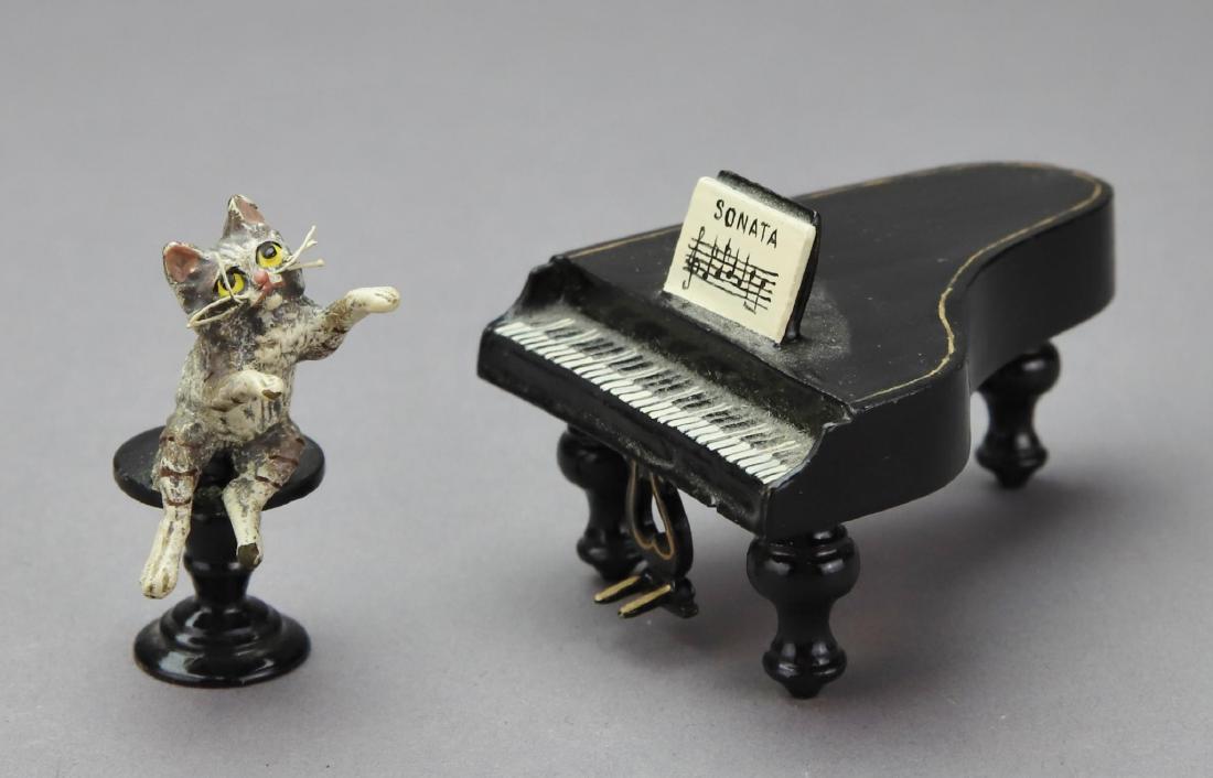 Fritz Bermann Cold Painted Bronze: Signed cold painted bronze of a cat playing a grand piano. 1.75"h x 2.75"d