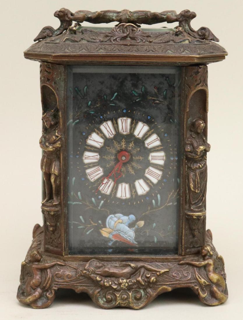 Bronze Renaissance Revival Carriage Clock: Case decorated with figural columns, nymphs, and winged dragons. 6”h x 4”w x 4”d