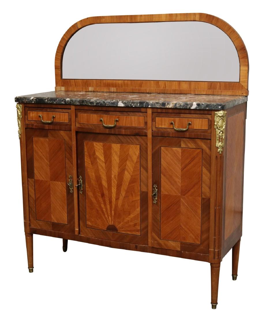 Mahogany Veneered and Ormolu Mounted Sideboard: Mirrored backsplash with a marble top, Lin’s head and floral mounts, three drawers over three doors on tapered legs. 58”h x 47”w x 18”d
