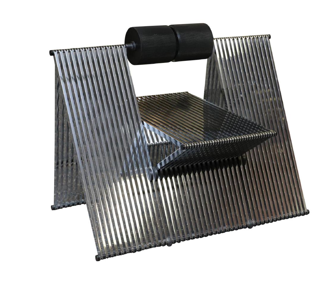 Mario Botta Quarta Chair: Aluminum angular design with a polyurethane backrest. 29"h x 38"w 24.5"d