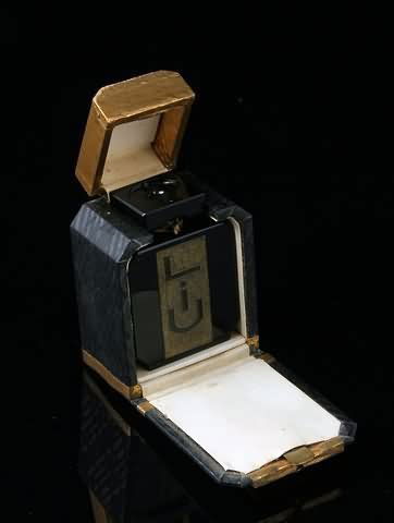 Guerlain Liu Perfume bottle: Circa 1930, in original black and gilt art deco box, height of bottle: 2 1/2". Shipping: $18