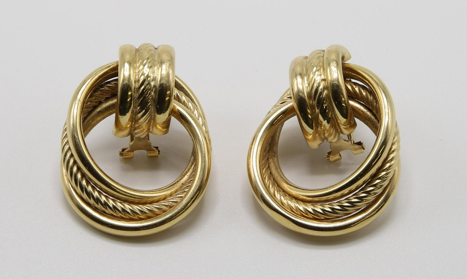 14KY Gold Earrings: 1 1/2 X 1 1/8". Omega back pierced. Tubular. 15.3gtw. Provenance: The Collection of Richard E. and Elisabeth S. Poole