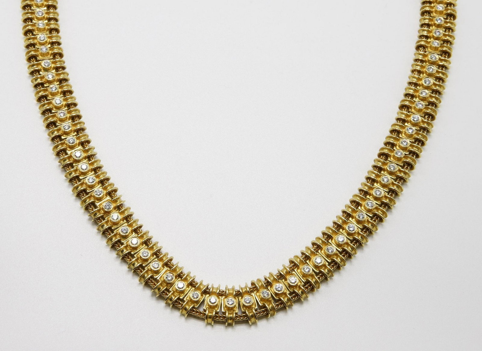 18KY Gold MAPAMENOE-NATEPAE Diamond Necklace: 16" long double wheat snake chain with single link slides. 11.6mm wide. Features (95) 2.5mm round bezel-set Diamonds, approx. 5.7ctw. 104.89gtw. Provenance: The Collection of Richard E. and Elisabeth