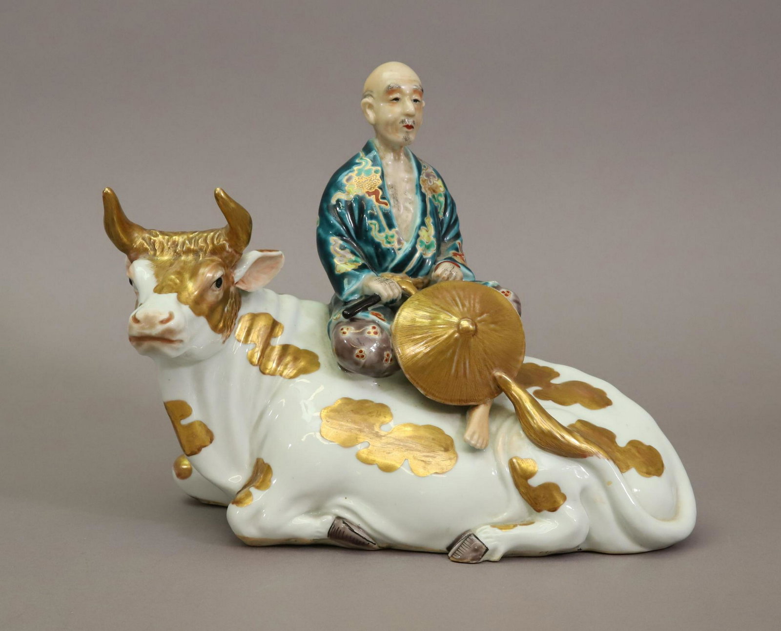 Japanese Porcelain Figure: Late 19th/early 20th century, porcelain figure of Lao Tzu on his ox. 8.5" x 10.5"