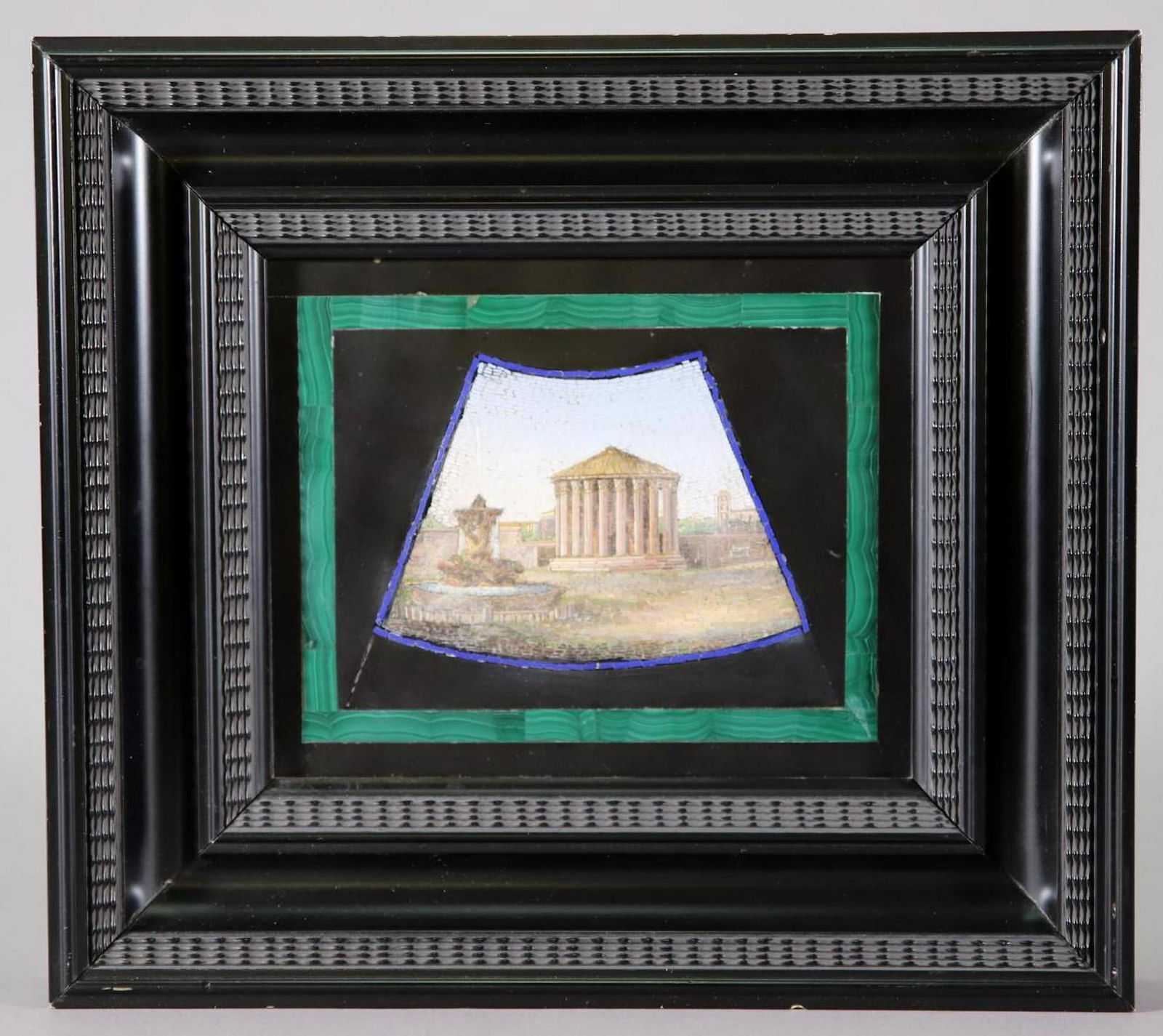 Italian Micromosaic Plaque: Large micro mosaic landscape of a Roman temple and fountain on marble with malachite border. 7"h x 8.5"w and 11.75"h x 13"w framed
