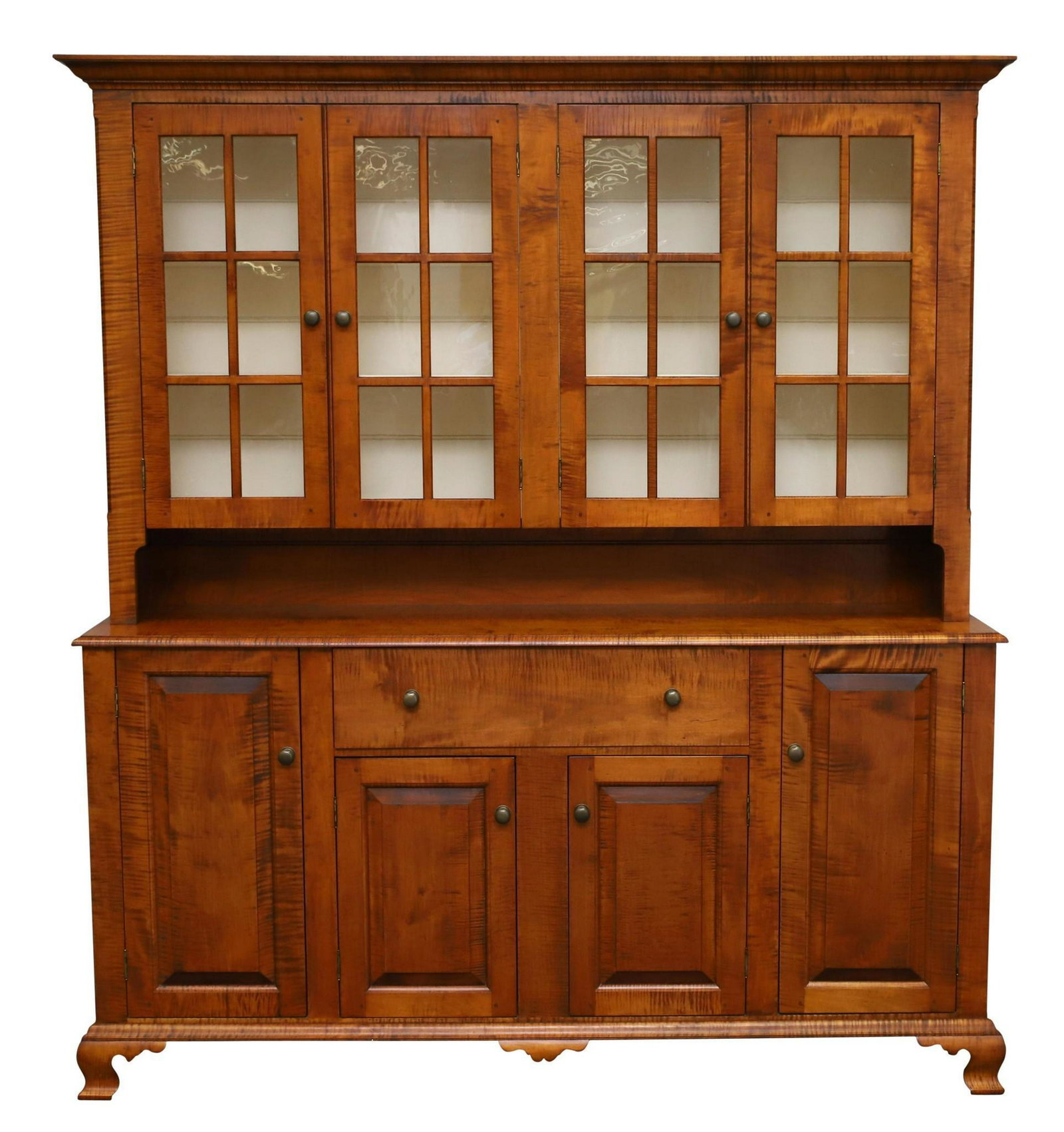D.R. Dimes Tiger Maple Dutch Cupboard: From the Benchmark Collection. Molded cornice with four glazed doors over one drawer and four doors on ogee feet. 81"h x 72"w x 18"d with an 8" pie shelf