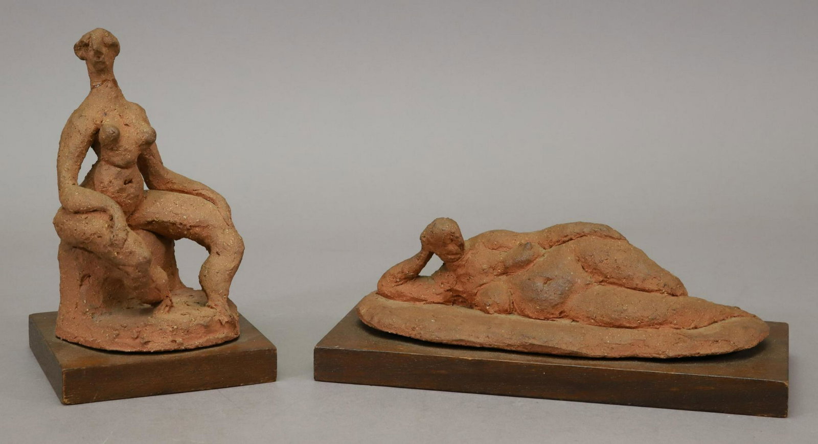 Joseph J Greenberg Jr (1915 - 1991): Terracotta, Grouping of two figural female nudes. The seated sculpture has a repair. Both signed and dated 1959. 6.25"h x 4"w and 2.5"h x 8.5"w not including plinths.