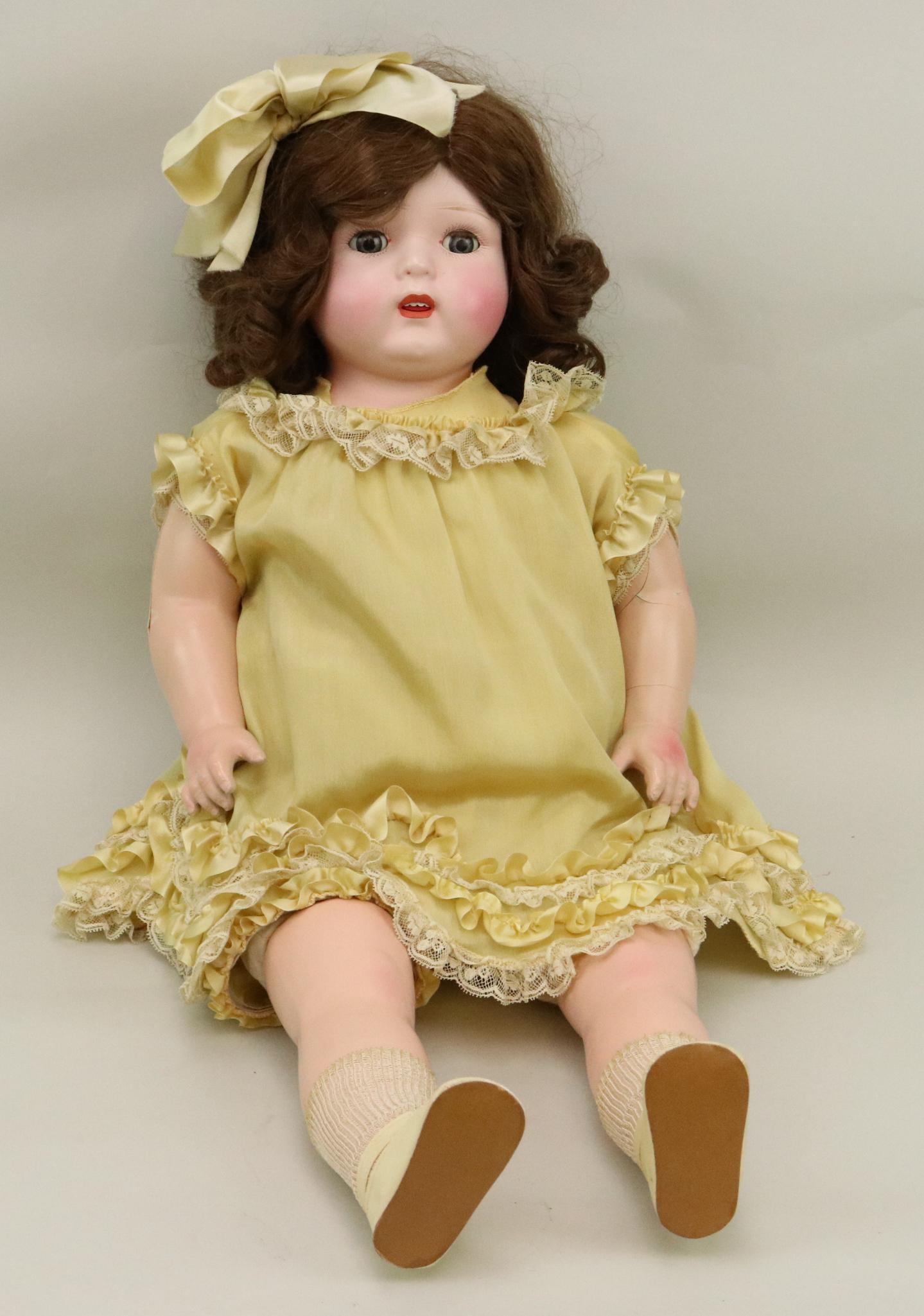 27" ACME TOY CO. COMPOSITION MA-MA DOLL.: Doll appears to be all original. "Annette" 1928-1932. Blue tin sleep eyes, open mouth, curly brown human hair wig. Composition shoulder head, arms and lower legs with cloth body. Dressed in beautiful 