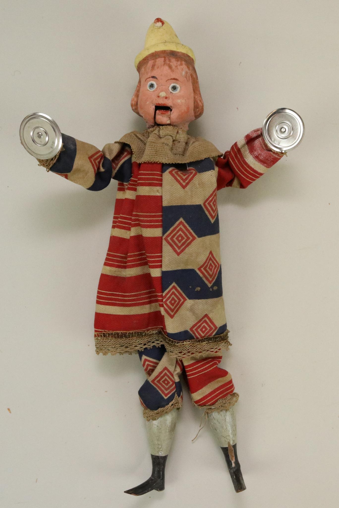 LOT OF HOLIDAY/NOVELTY.: 13 1/2" All original German clown squeak toy with cymbals. Papier mache head, woode/wire armature body. Mouth opens/closes with string at back of head. Plays cymbals when stomach is squeezed. Conditio