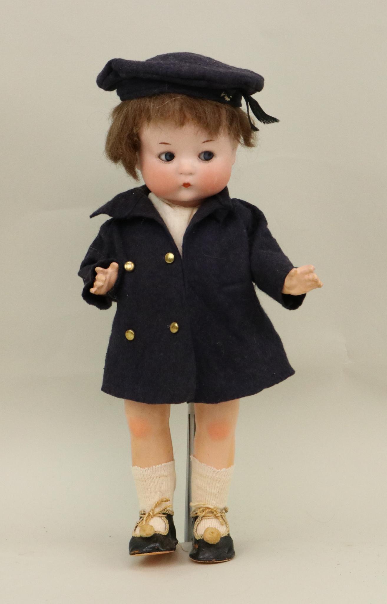 JUST ME DOLL.: 12 1/2"JUST ME Registered Germany A.310/0.M. doll with blue side glance eyes, closed mouth, brown mohair wig. 5 Pc. composition body. Dressed in original wool felt coat, hat, cotton underwear. Also co