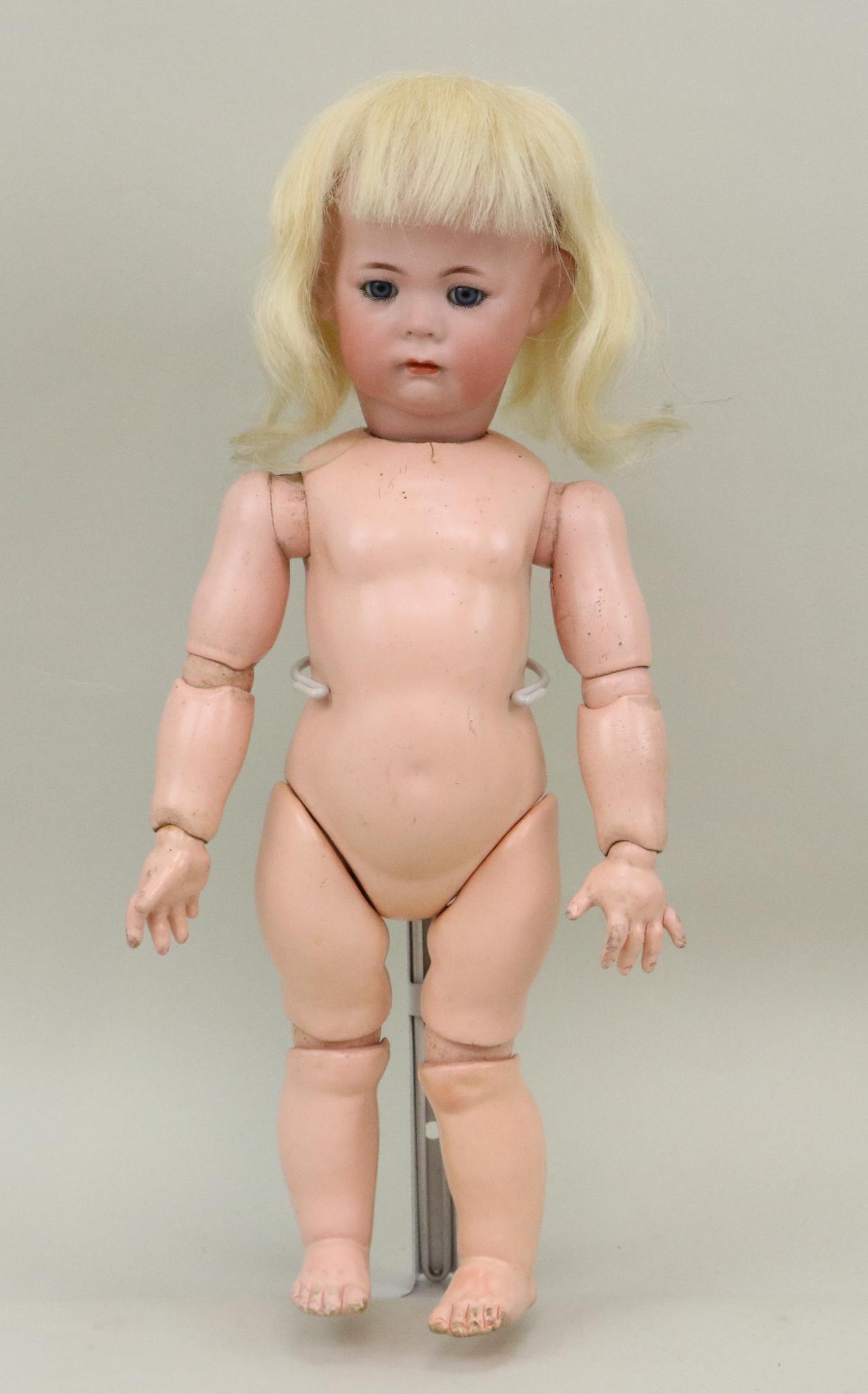 ANTIQUE BISQUE HEAD GERMAN DOLL.: 15" 1 K * R S & H 115/A 38 character doll with blue sleep eyes, closed mouth, blonde human hair wig. Papier mache fully jointed toddler body. NO clothing. Stand. Condition: wig pull on back of head, o
