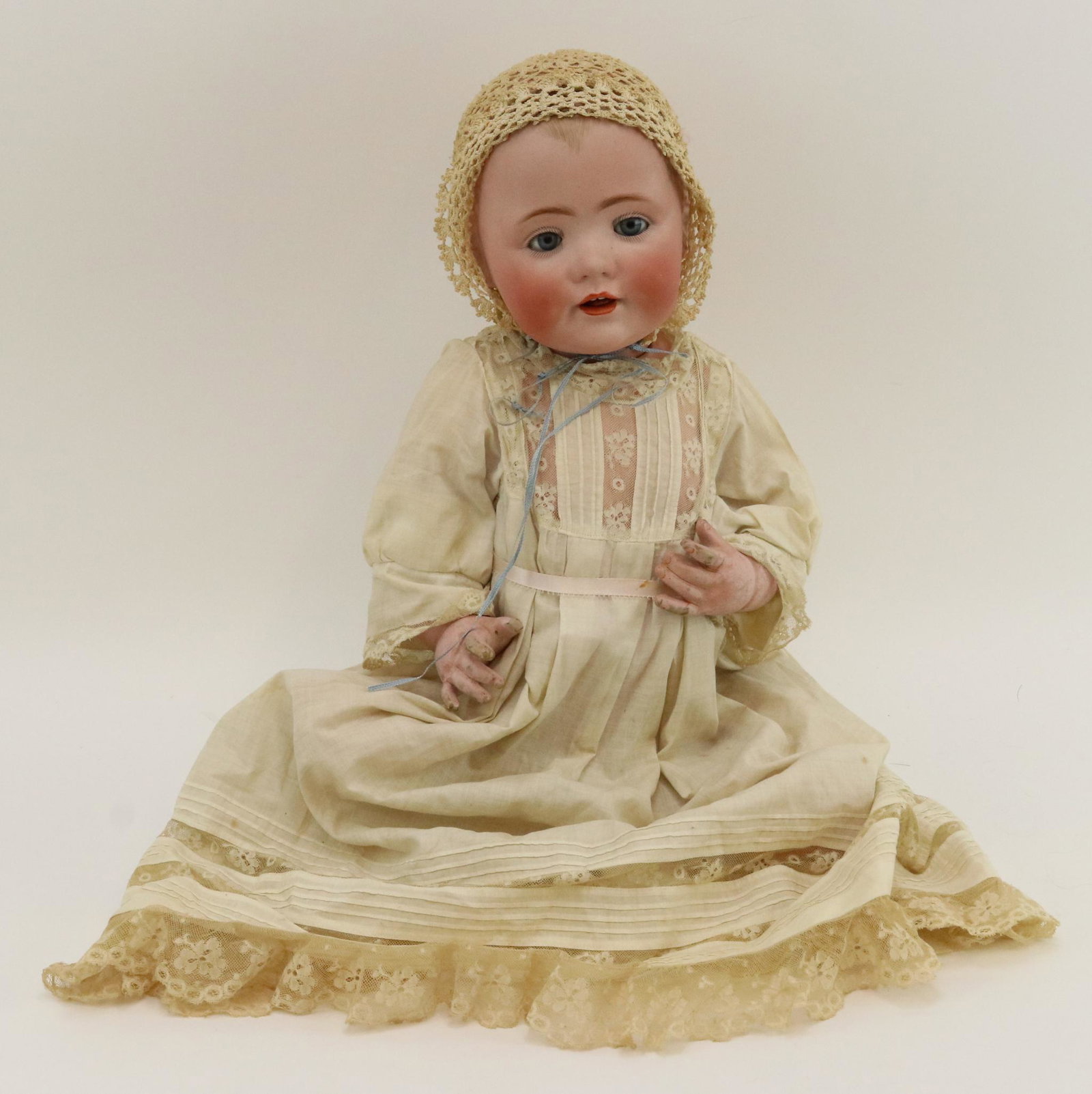 ANTIQUE GERMAN BISQUE DOLL.: 22" J.D.K. 17 MADE IN GERMANY solid dome "Baby Jean" character baby. Blue sleep eyes, open mouth with woggle tongue, painted blonde hair. Very nice coloring. 5 Pc. papier mache bent limb baby body. Dr
