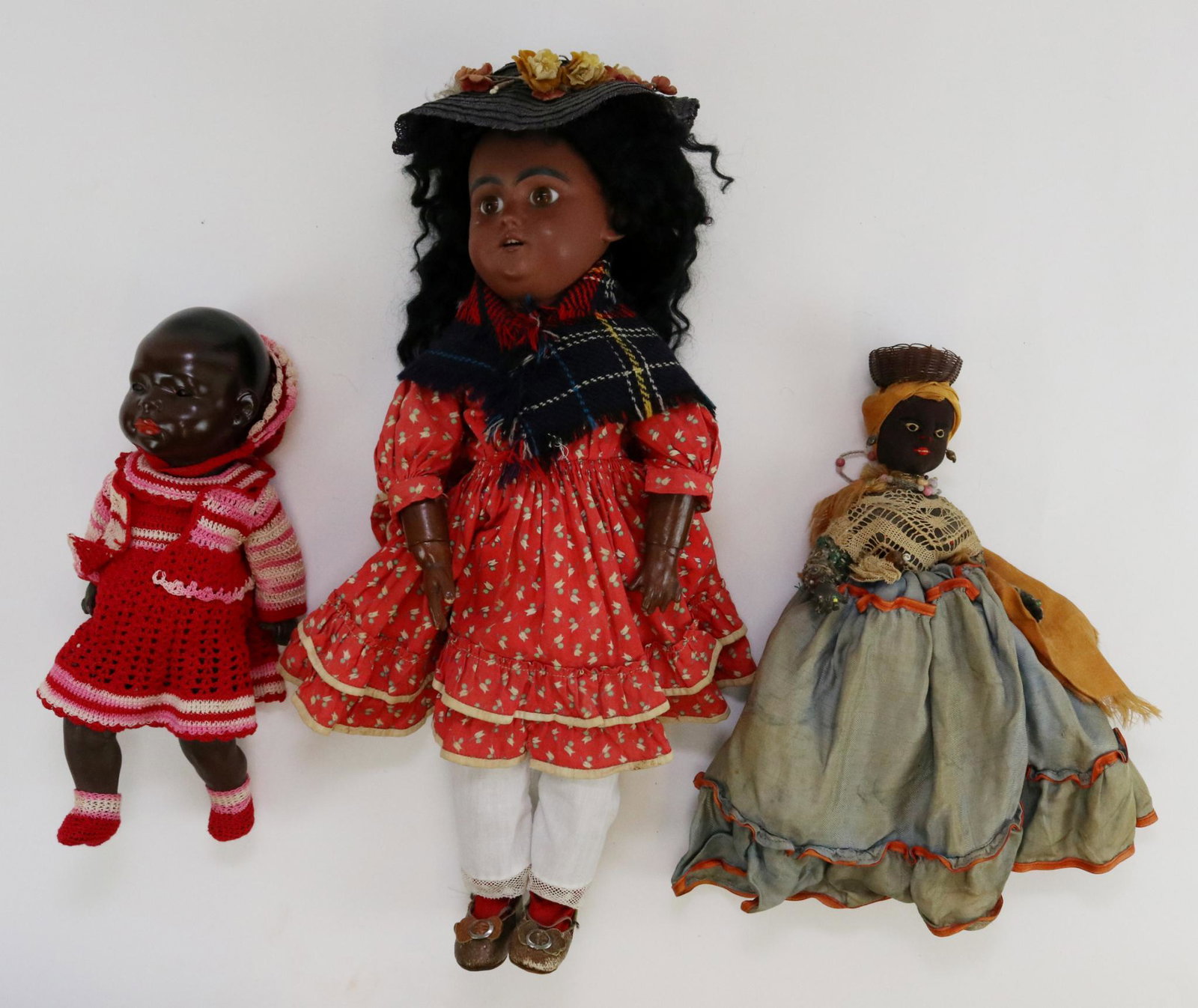 BLACK DOLL LOT.: Loit of (3) dolls. 16" SH 1039 7 1/2 DEP Bisque head doll. Stationary brown eyes, open mouth, pierced ears, black mohair wig. Papier mache unmarked French style jointed body. Dressed in vintage cotton