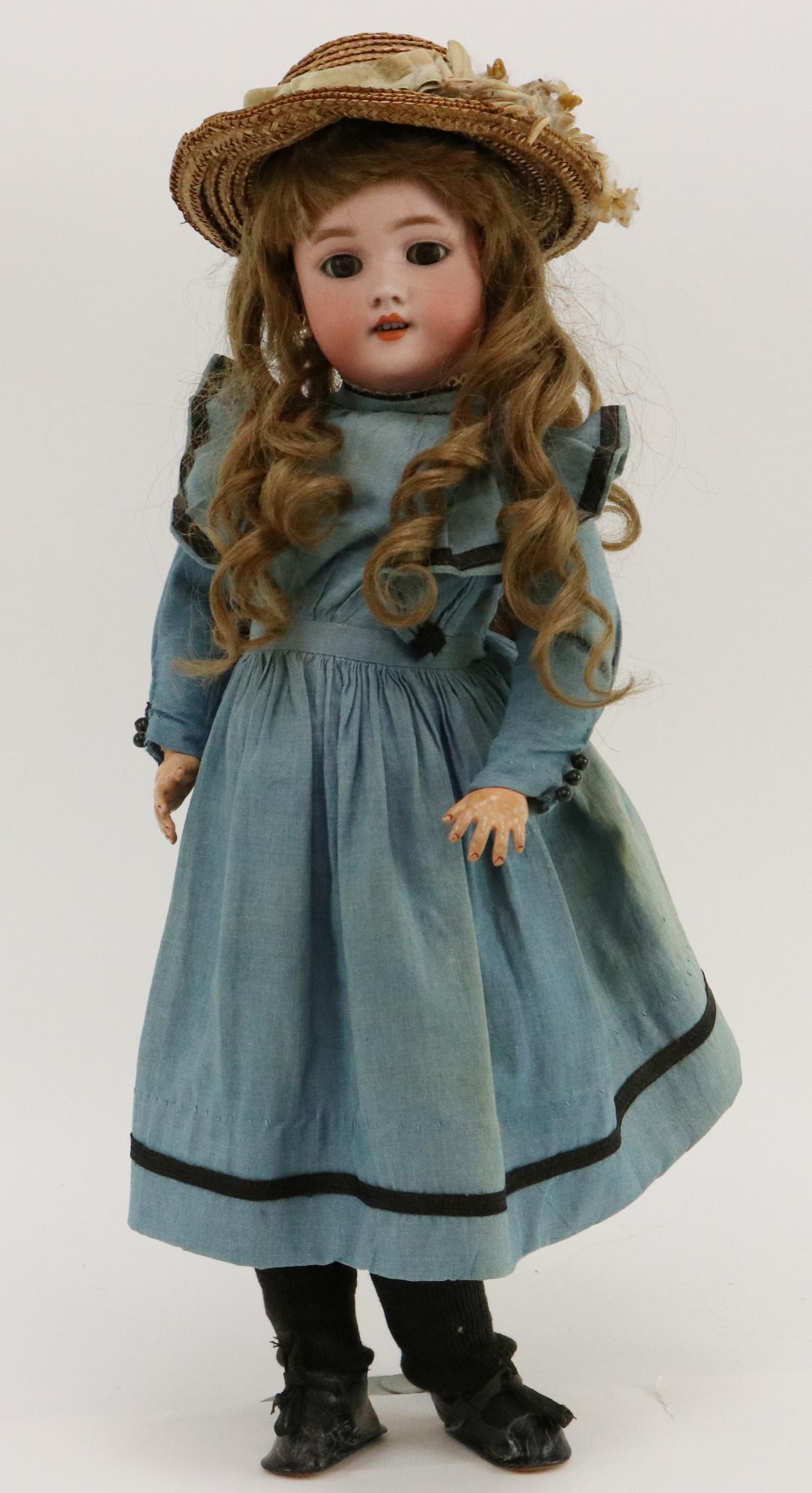 ANTIQUE GERMAN BISQUE DOLL.: 19 1/2" GERMANY HEINRICH HANDWERCK SIMON & HALBIG 2 1/2 doll with brown sleep eyes, open mouth, pierced ears, brown French human hair wig. Papier mache ball jointed body is marked (red stamp) HEINRICH