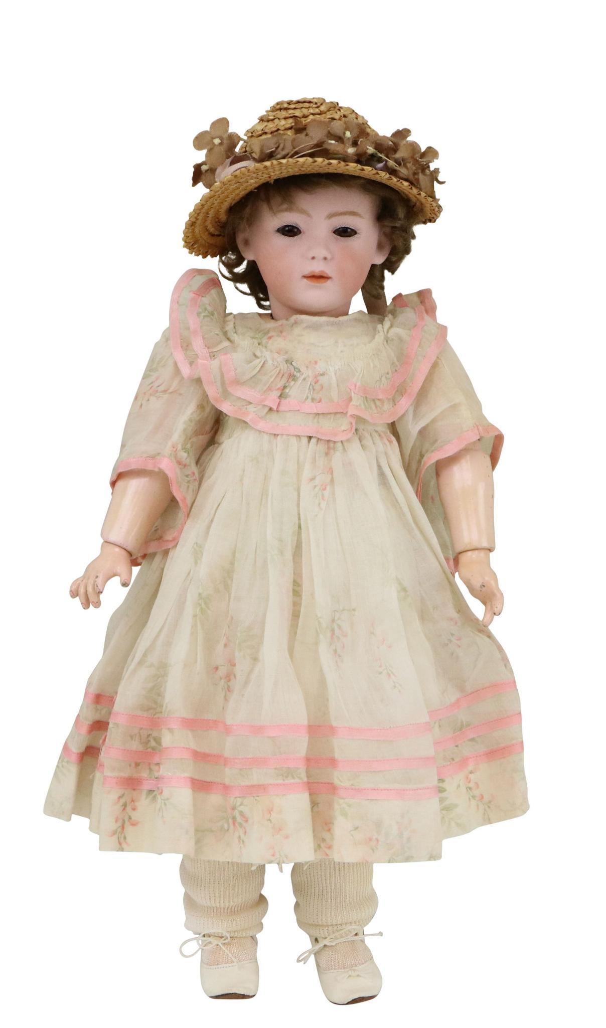 ANTIQUE GERMAN BISQUE DOLL.: 17 1/2" 7407 6 GERMANY (HEUBACH) pink bisque "pouty" doll with brown sleep eyes, closed mouth, dimples in cheeks, brown mohair wig. Papier mache ball jointed body. Dressed in antique clothing: cotton 