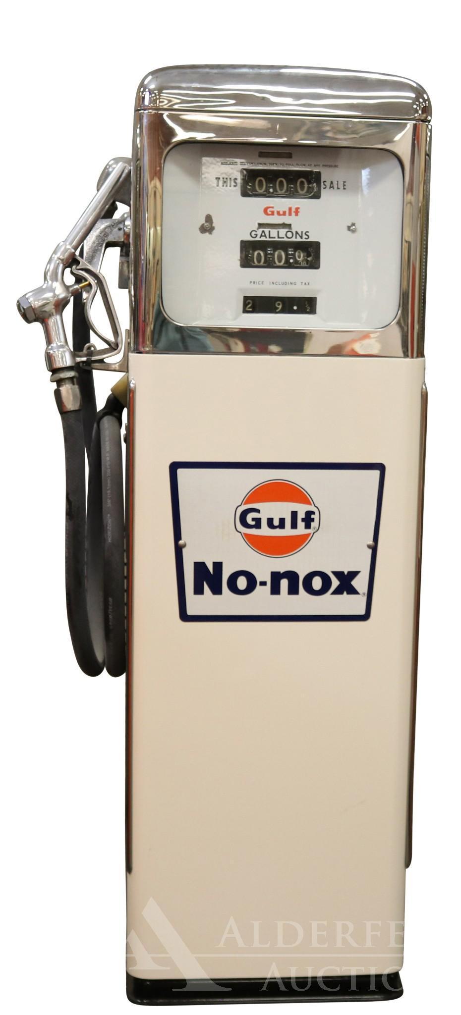 Wayne Gas Pump Restored in Gulf No-Nox Gasoline: Wayne Gas Pump Restored in Gulf No-Nox Gasoline. Gulf logo plate attached to front. Porcelain pump face shows wear. ID tag attached to side (no model number). Includes nozzle and hose. Measures 21"w x