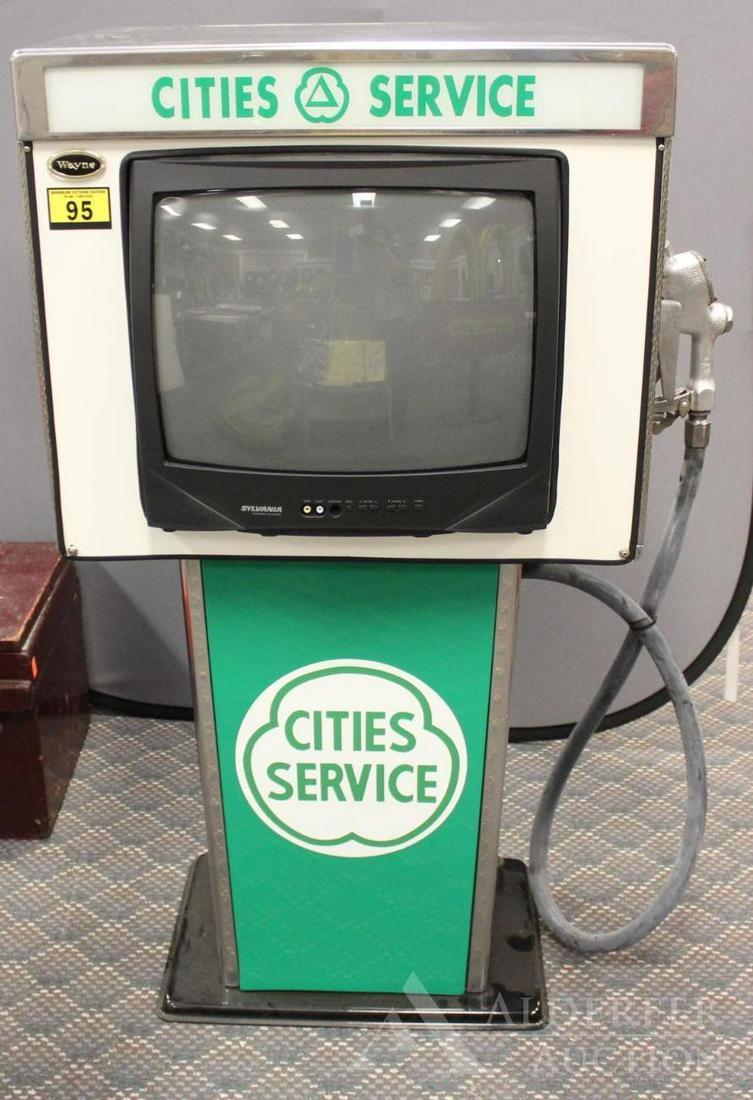 Cities Service Gas Pump/Television: Cities Service gas pump with chrome base. Includes nozzle and hose. Retrofitted for a television. Measures 27"w x 19"d x 51"h The Alderfer Shipping Department is not able to ship the majority of items