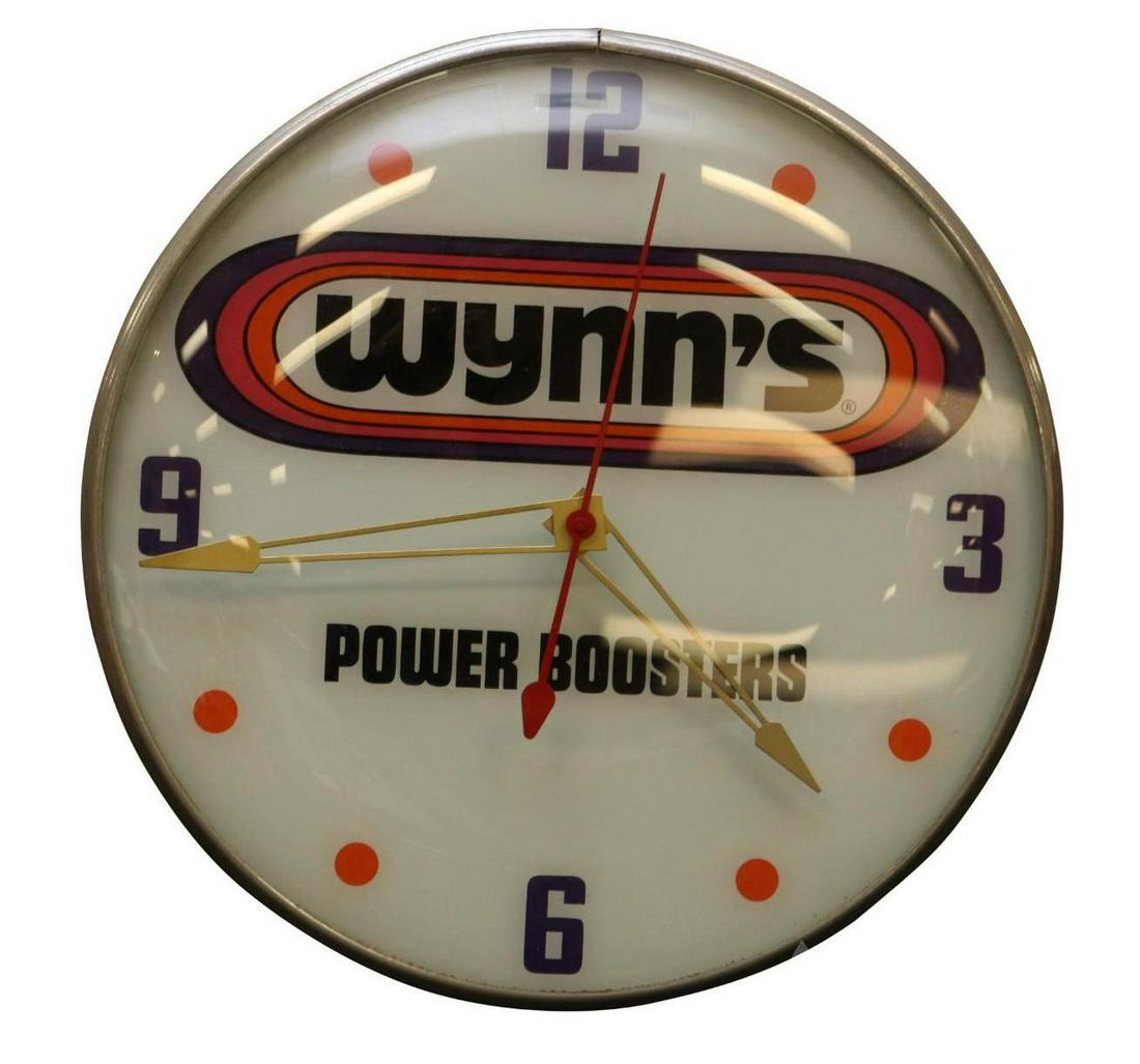 Wynn: Illuminated advertising clock "Wynn's Power Boosters", made by Pam Clock Co. AluminumÂ case. Measures 15" diameter x 3"d