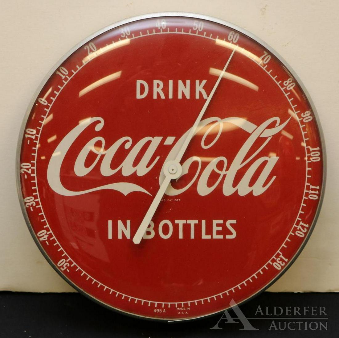 Coca-Cola Advertising Thermometer: Coca-Cola advertising thermometer, graphics read "Drink Coca-Cola in Bottles", measures 12"h The Alderfer Shipping Department is not able to ship the majority of items in this auction due to their siz