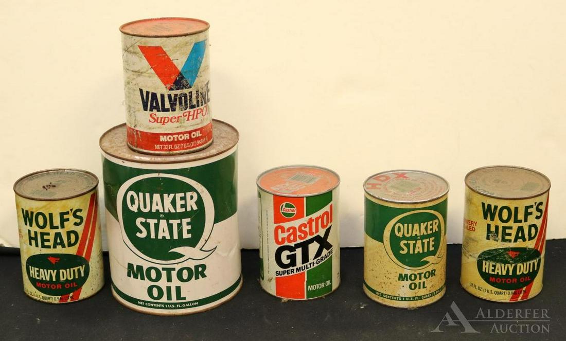 Cardboard & Metal Motor Oil Containers: 1 Gallon Quaker State Oil, metal, dents, rust. Cardboard quarts: Castrol Oil, Wolf's Head (2), Quaker State, Valvoline.