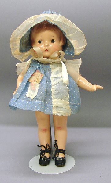 14" Compo Effanbee Patsy Doll with Wardrobe: 14" Effanbee Patsy doll and large wardrobe. Nice coloring. This is an original owner doll and she was loved and given many clothes over the years inc. (3) pairs of shoes, roller skates, mocassins, sno