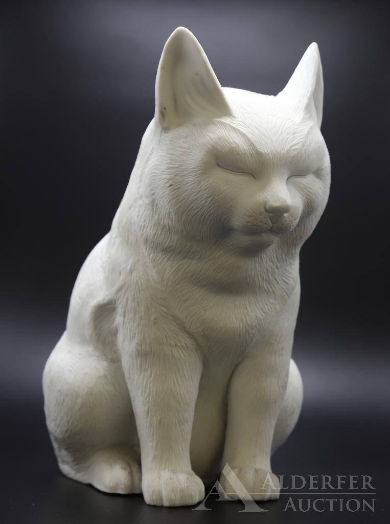 Hirado Bisque Cat: Meiji Period unglazed bisque porcelain sculpture of a sitting cat with its eyes closed. 8"h x 6"w x 6.5"d
