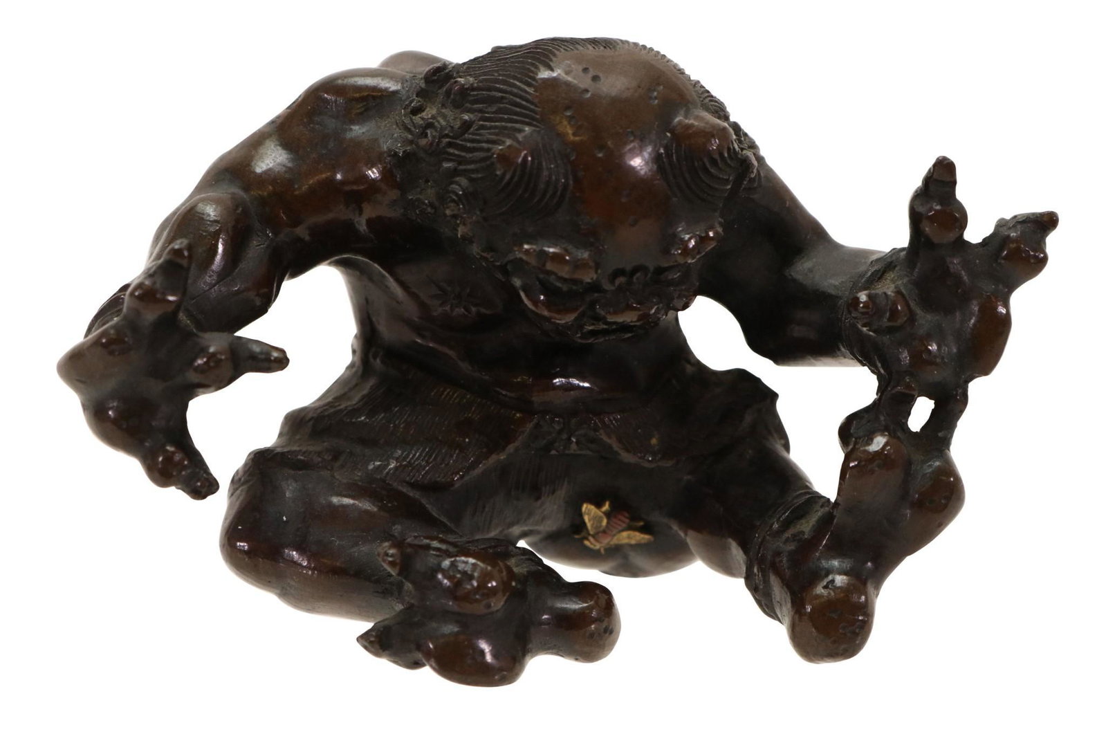 Meiji Miniature Bronze Okimono: Diminutive sculpture of an Oni with an applied gold fly. 2"h x 3"w x 2"d
